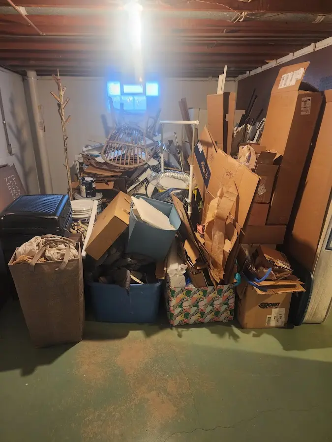 Roll-off dumpster container at job site for Roll Off Dumpster Rental in Charlestown